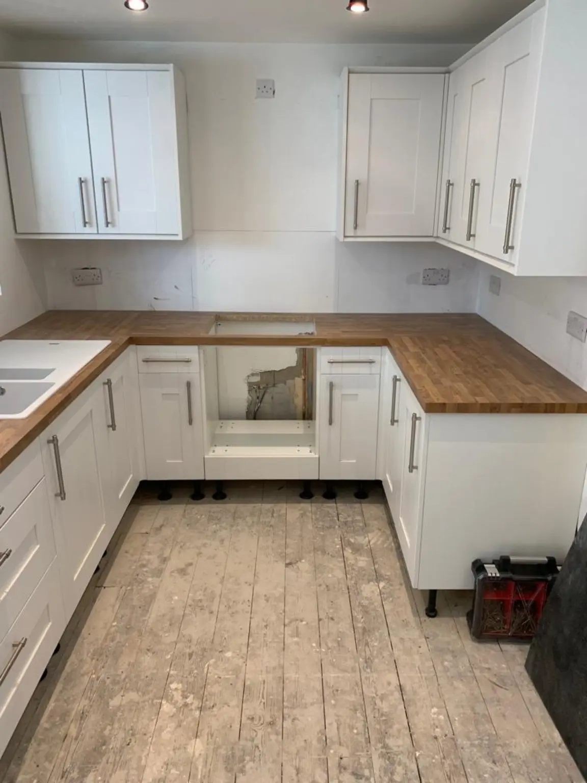 Kitchen worktop fitting and cabinetry details used to explain installation costs
