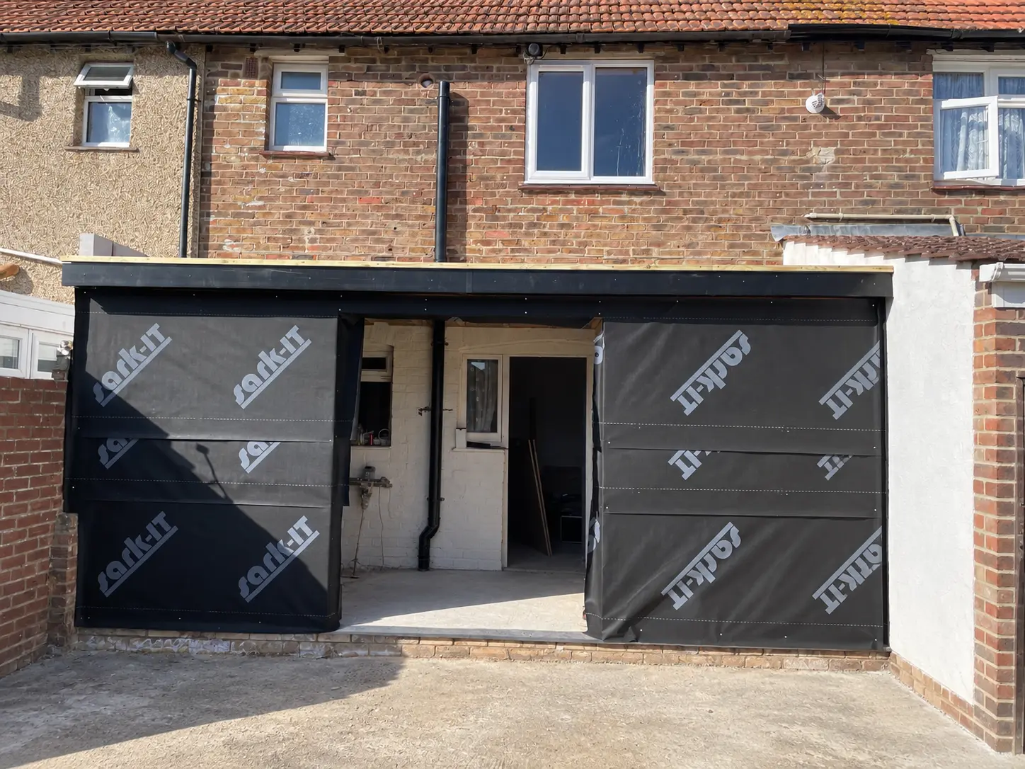 Rear extension construction showing work included before finishes