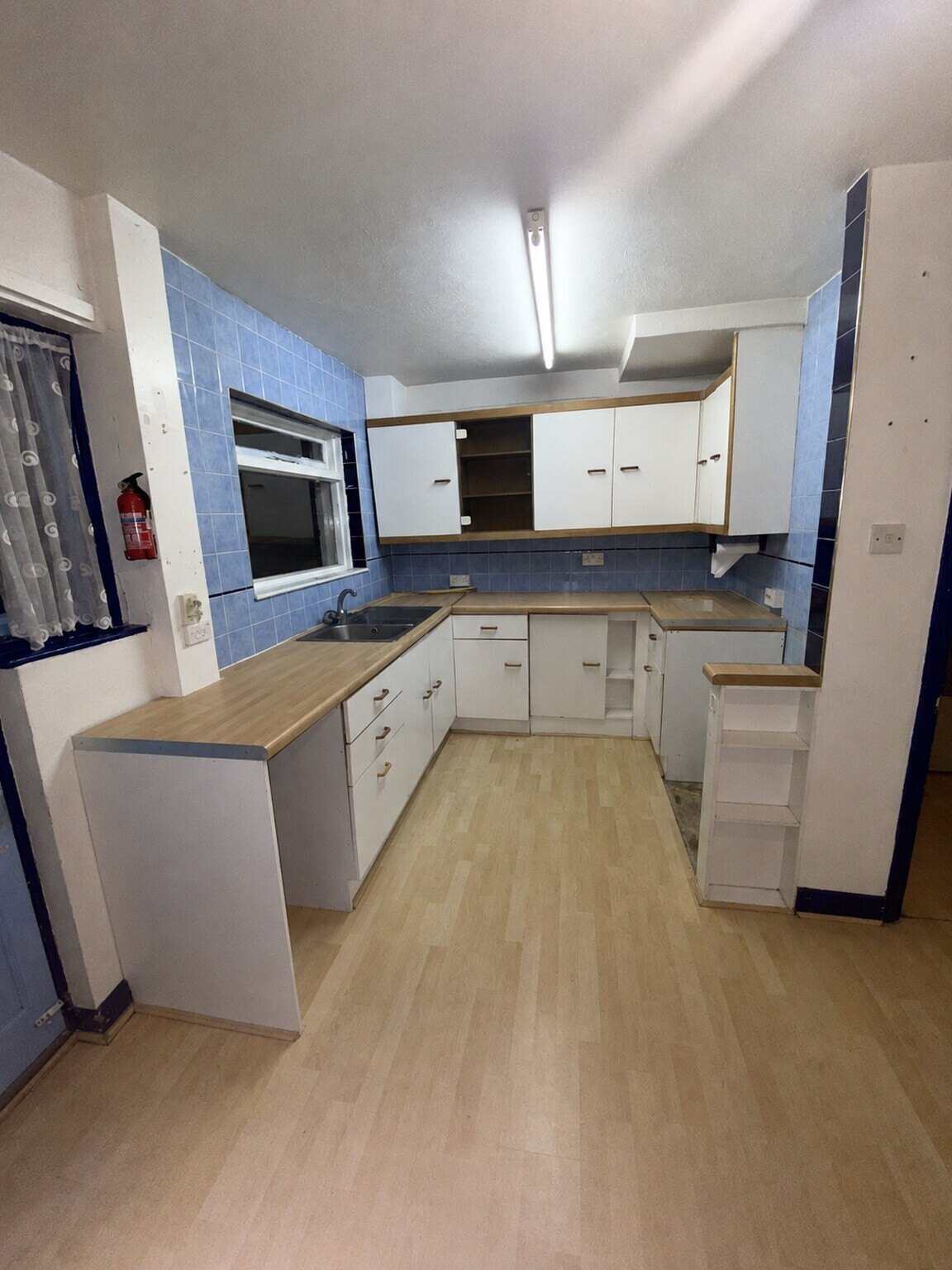 Dated kitchen before a complete refurbishment in Bognor Regis