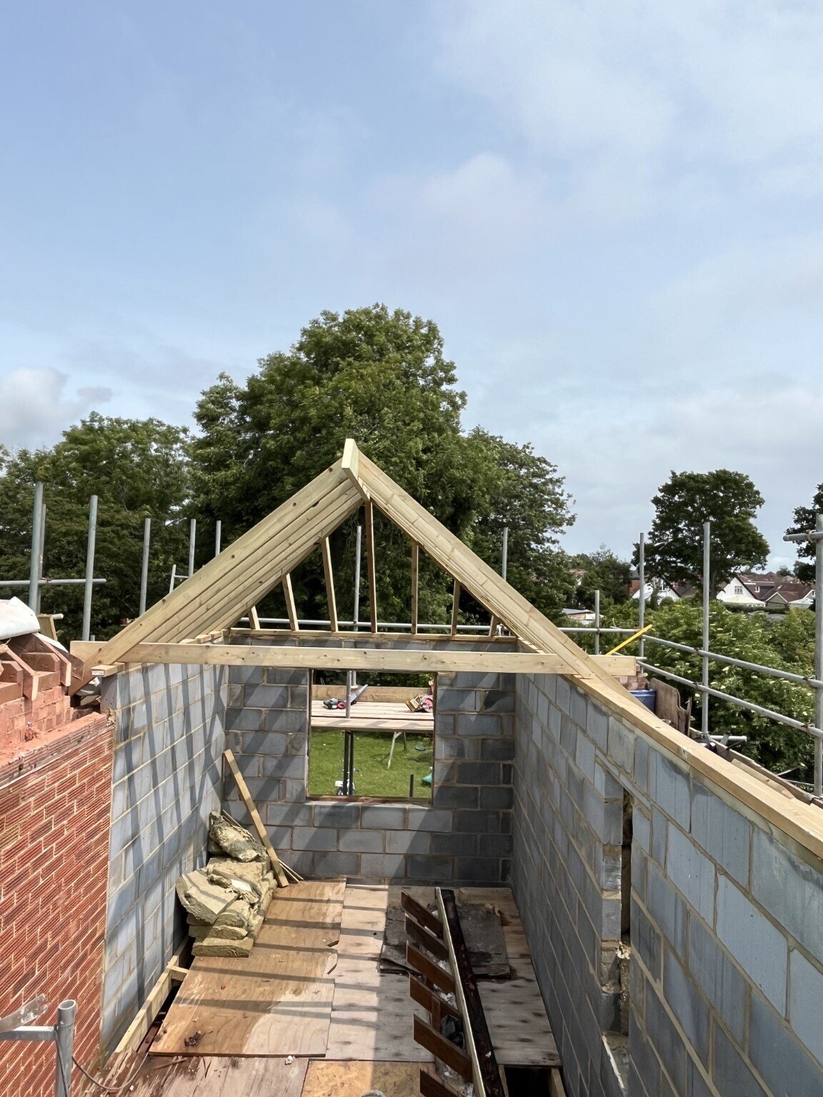 Initial cut-roof framing over blockwork during a Chichester roof project