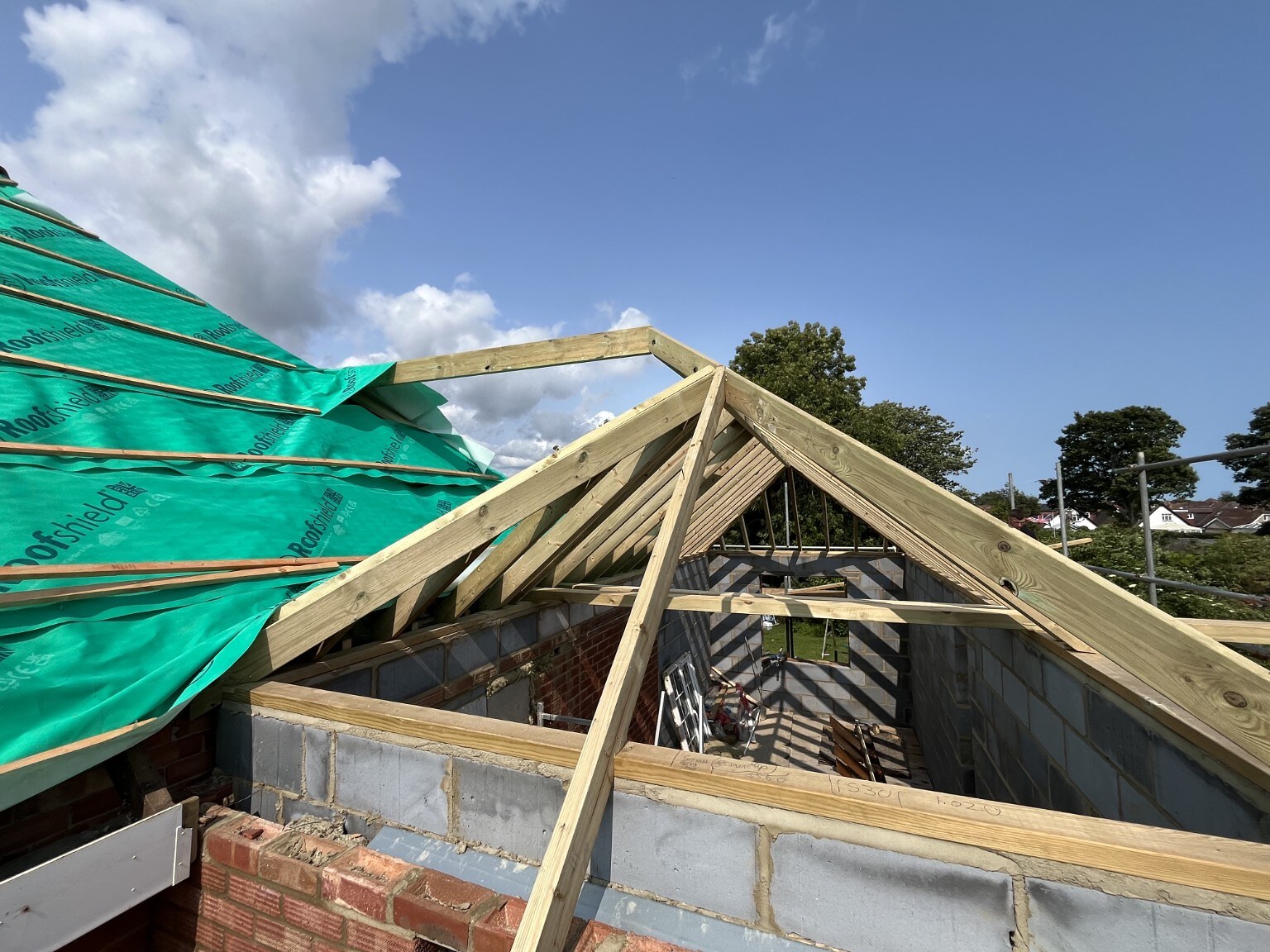 Pitched roof framing viewed from scaffold