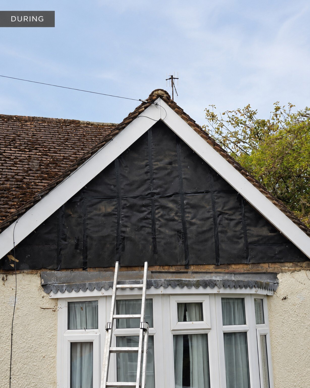 Gable prepared during a cladding replacement project in Felpham