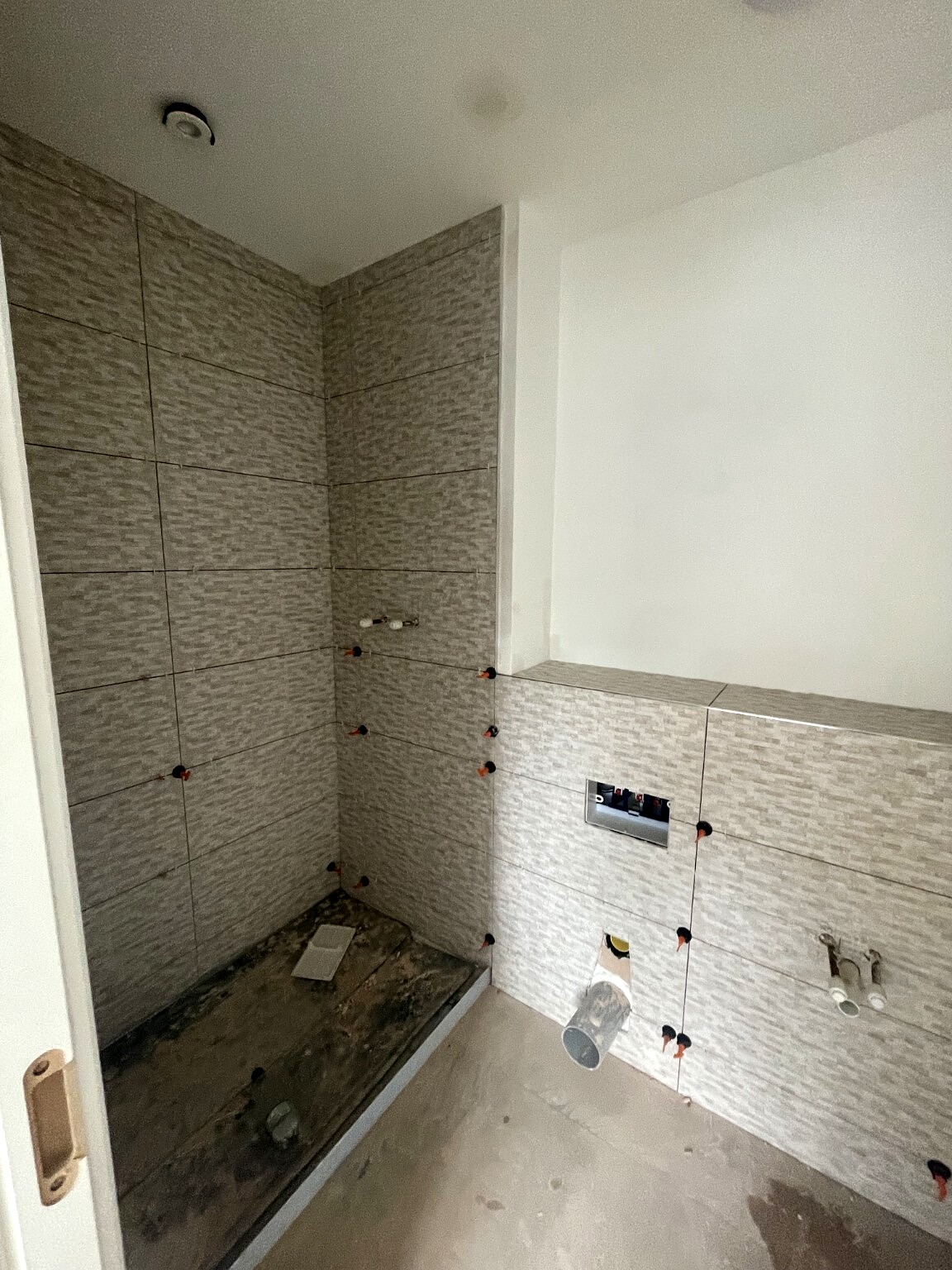 Bathroom shower area during installation