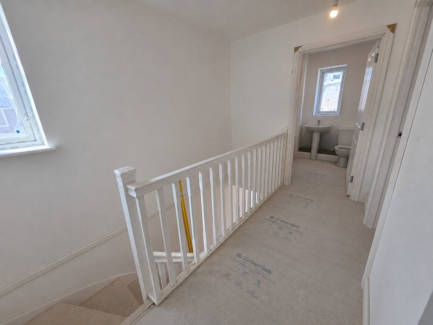 Landing balustrade, skirting and door openings on a Littlehampton new-build site