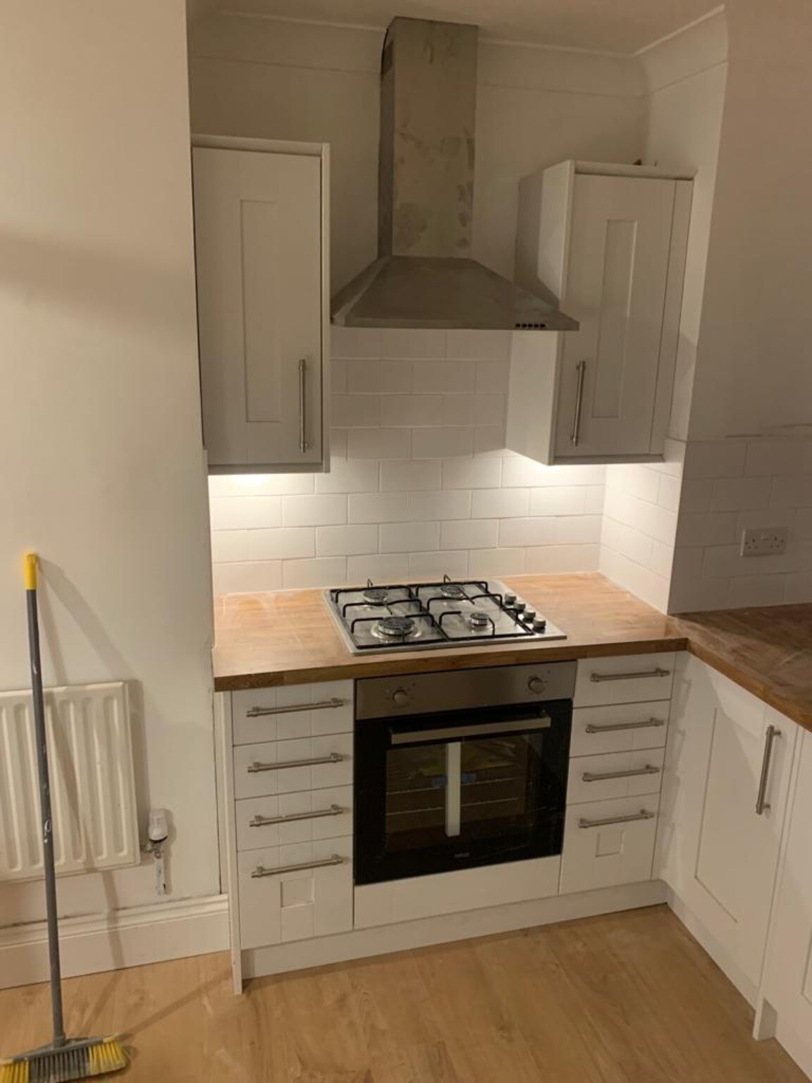Completed hob, oven and extractor installation in a Pagham kitchen