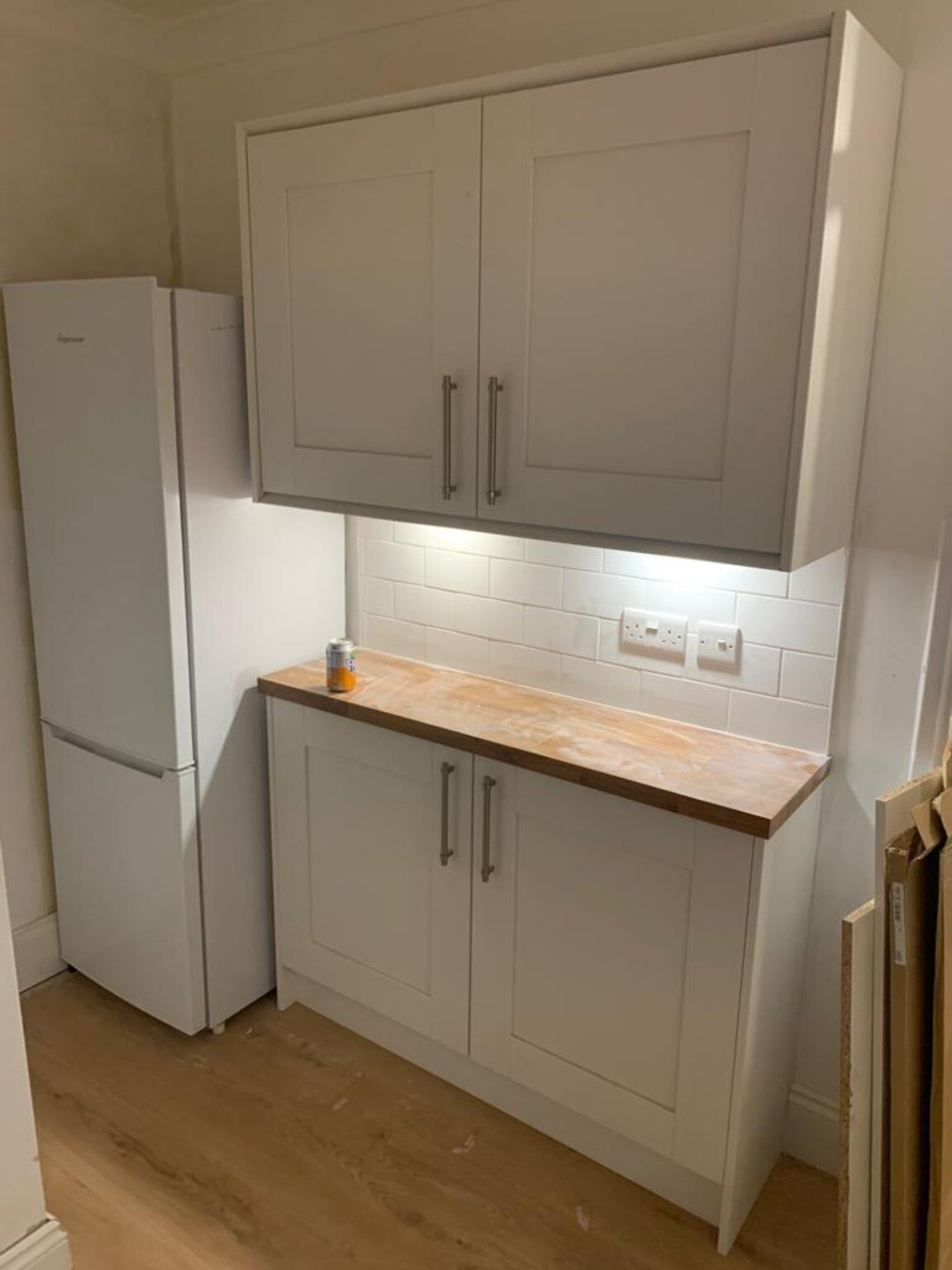 Completed fitted storage and fridge area after a Pagham kitchen refurbishment