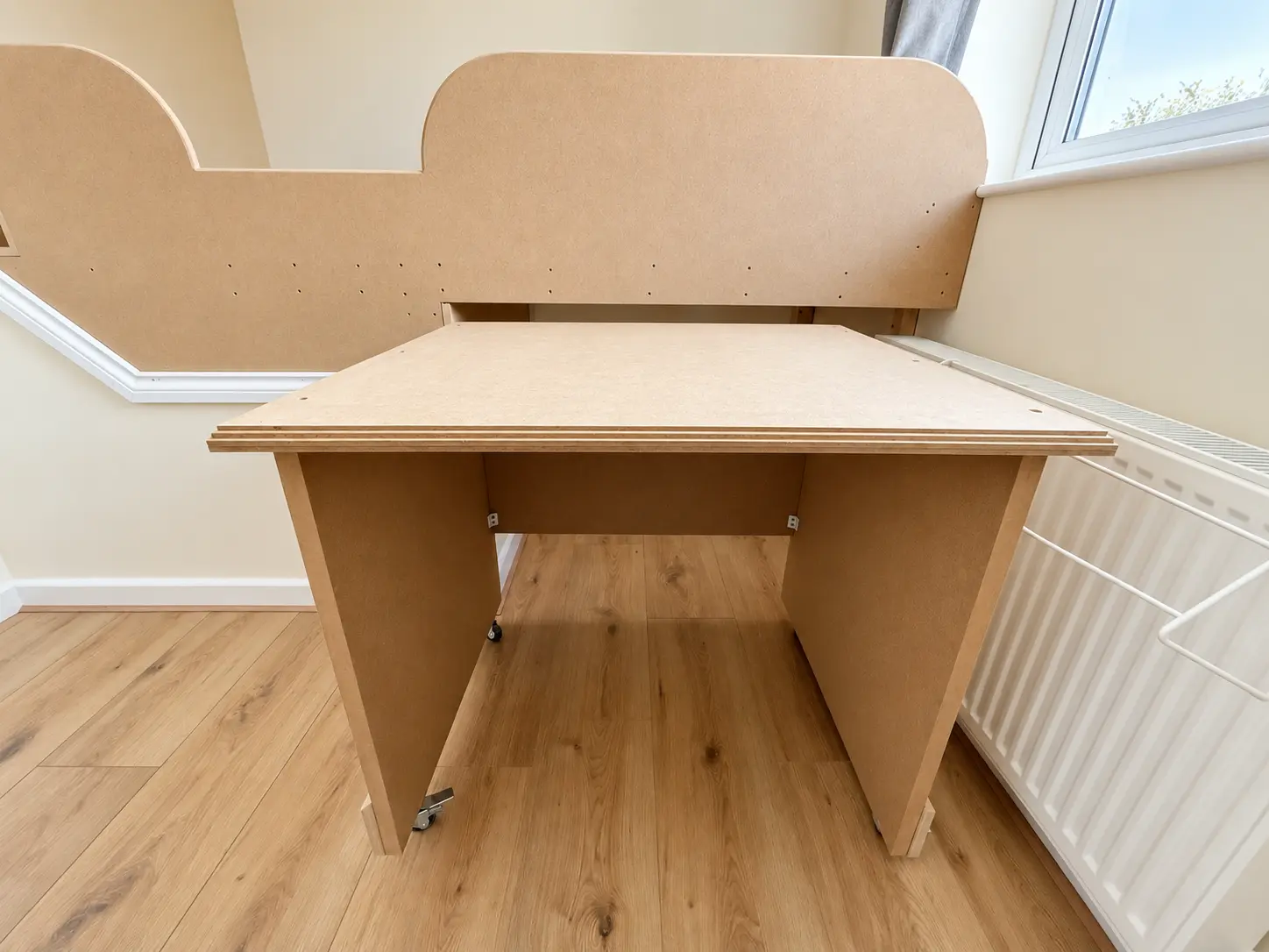 Bespoke raised bed and pull-out desk built in Emsworth