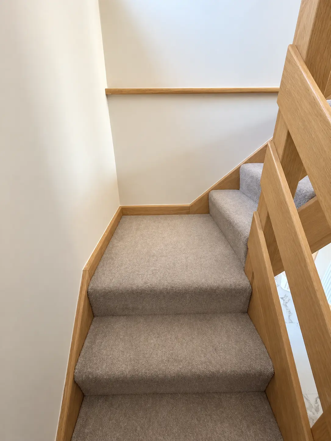 Carpeted winder treads with light-oak strings