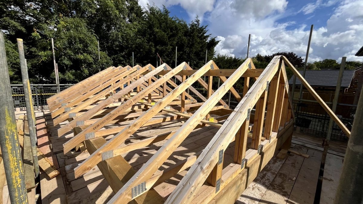 Timber roof framing under construction