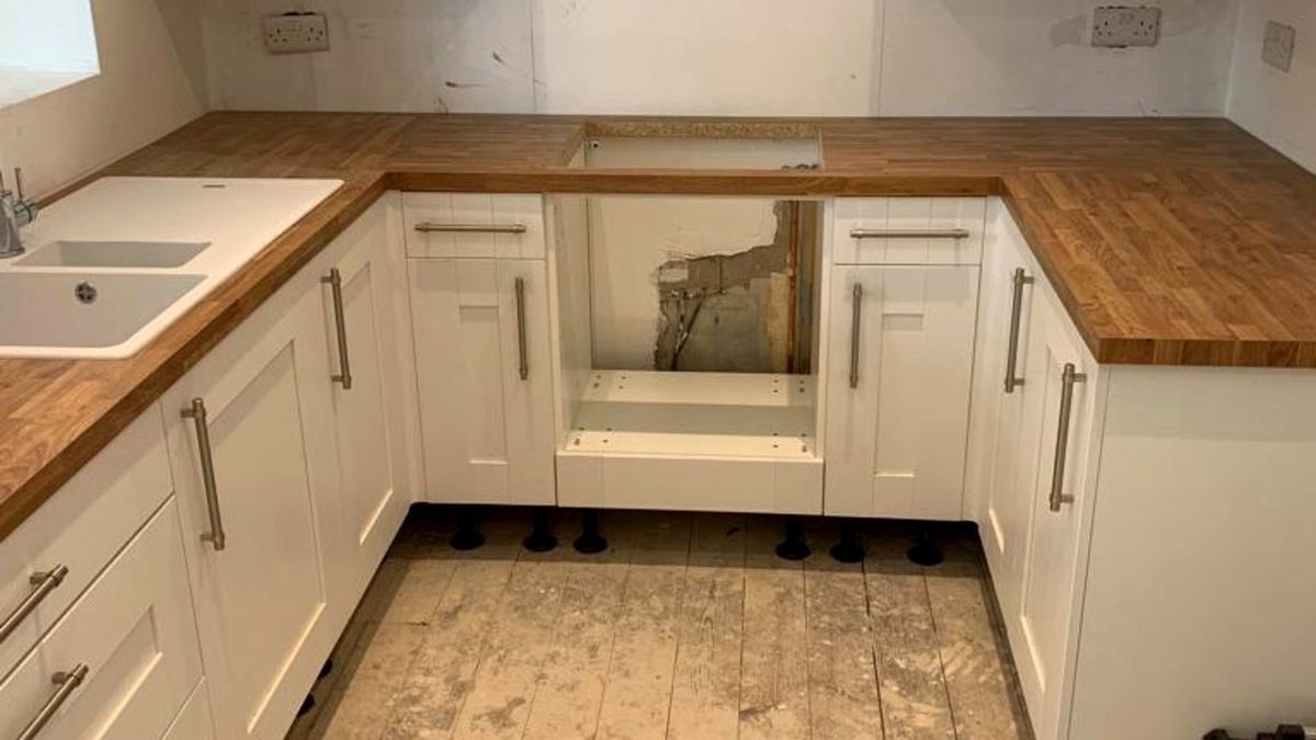 Shaker-style kitchen installation with timber worktops