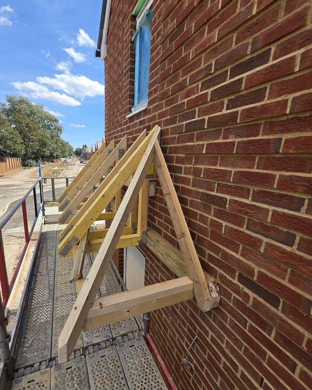 Hipped timber front-door canopy framing formed by Sixes Carpentry in Wick, Littlehampton
