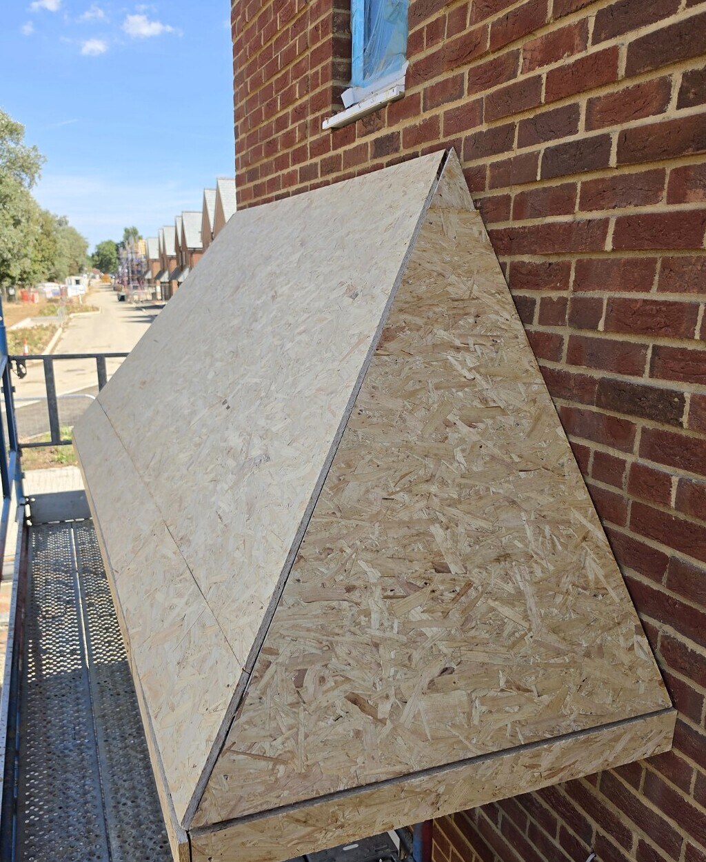 OSB deck completed over a hipped cantilever front-door canopy in Wick, Littlehampton