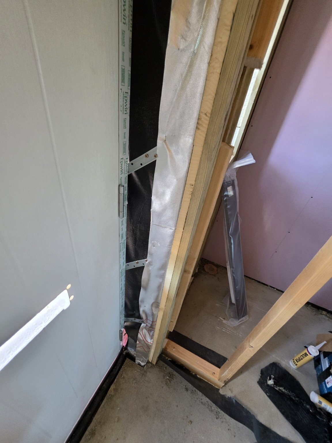 Membrane and sealing detail beside a newly installed front door in Wick, Littlehampton
